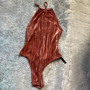 Free people pink velvet body suit, open back with straps, never worn